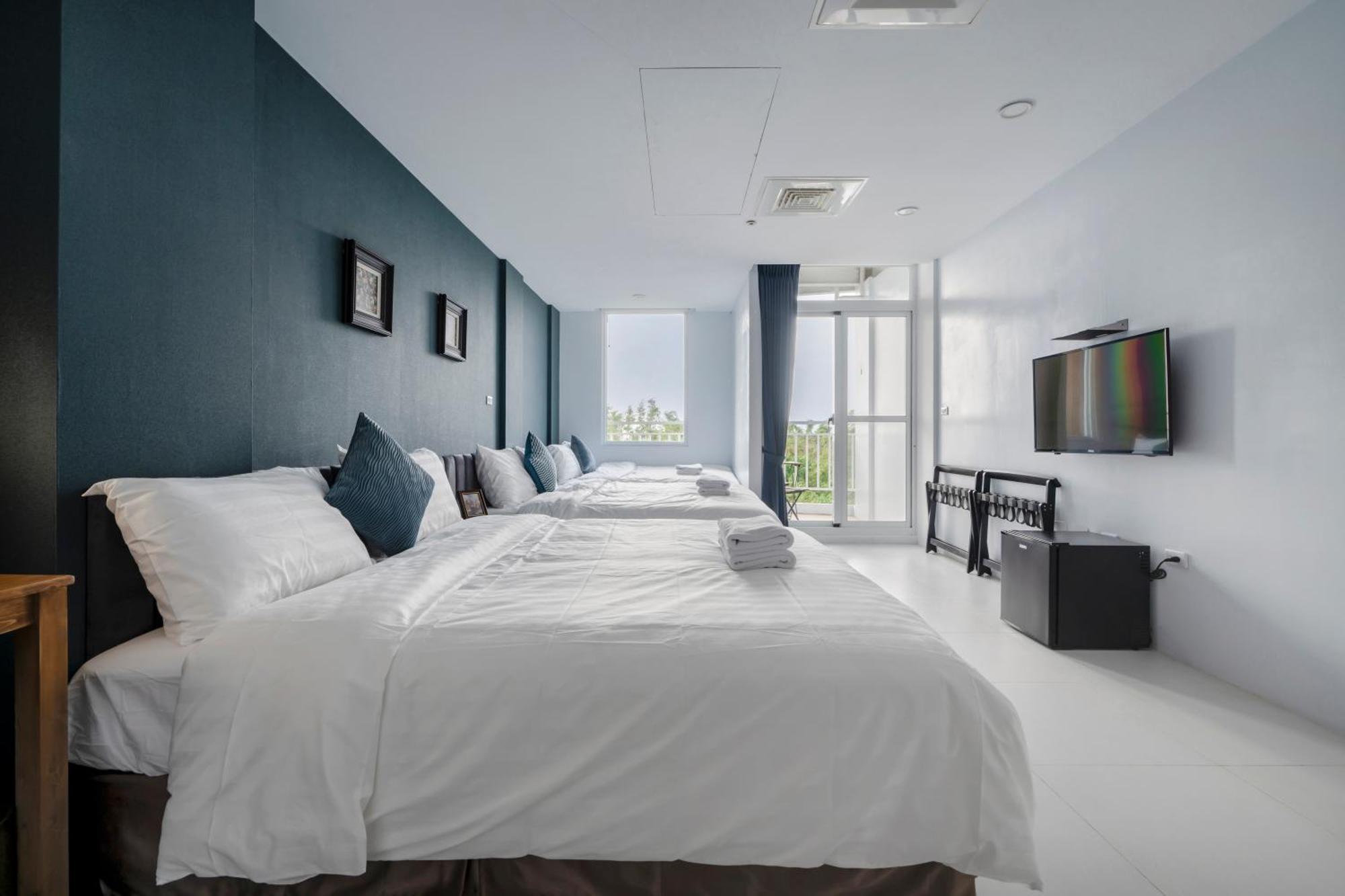 Sunset Mu Style Inn Сяолюцю Номер фото
